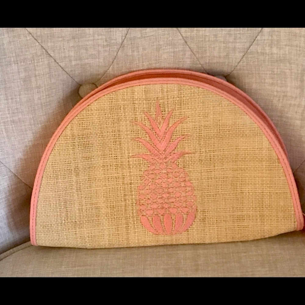 Lovely salmon colored “Margaritaville” straw clutch